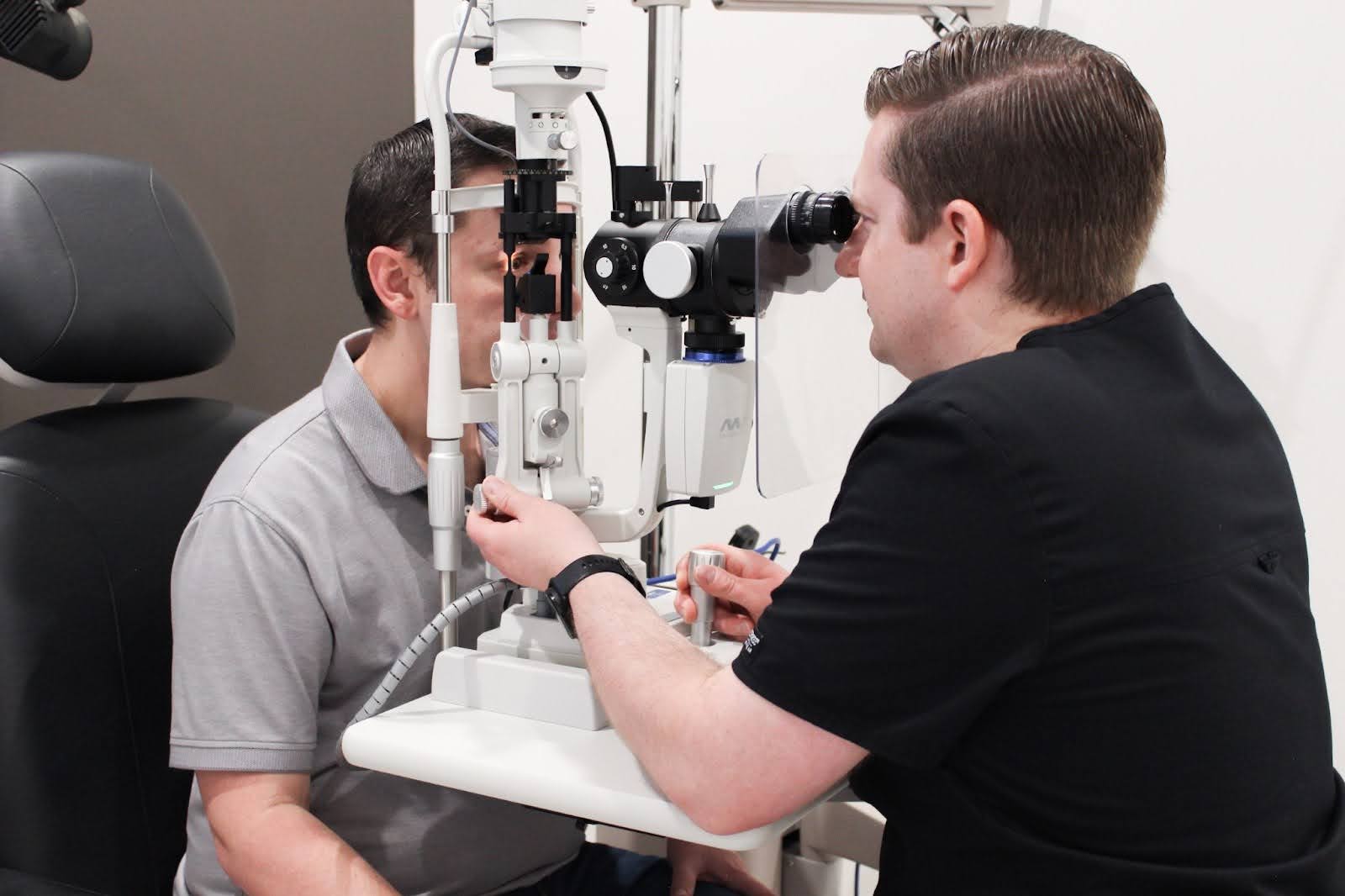 Dr. Matt Kauffman performing eye exam at Contemporary Eye Care in Katy TX